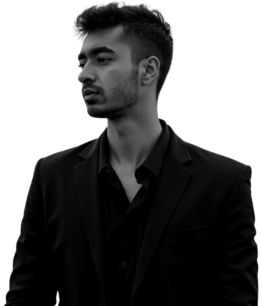 Portrait of Kamil Hassan looking sideways.